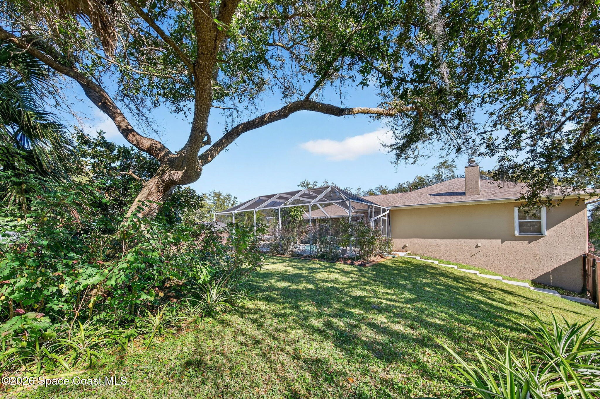 3676 South Ridge Circle Titusville, FL 32796 - Photo 63 of 74 a view of a house with a yard