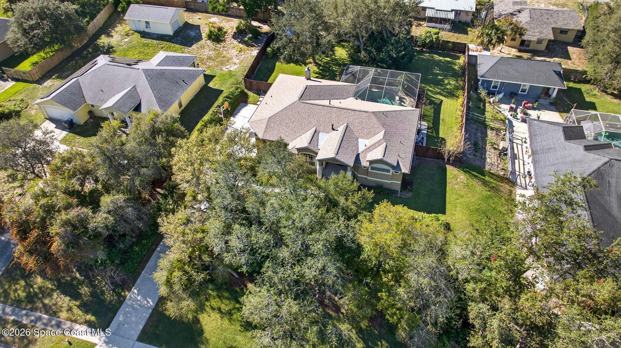 3676 South Ridge Circle Titusville, FL 32796 - Photo 66 of 74 an aerial view of a house with a yard basket ball court and outdoor seating