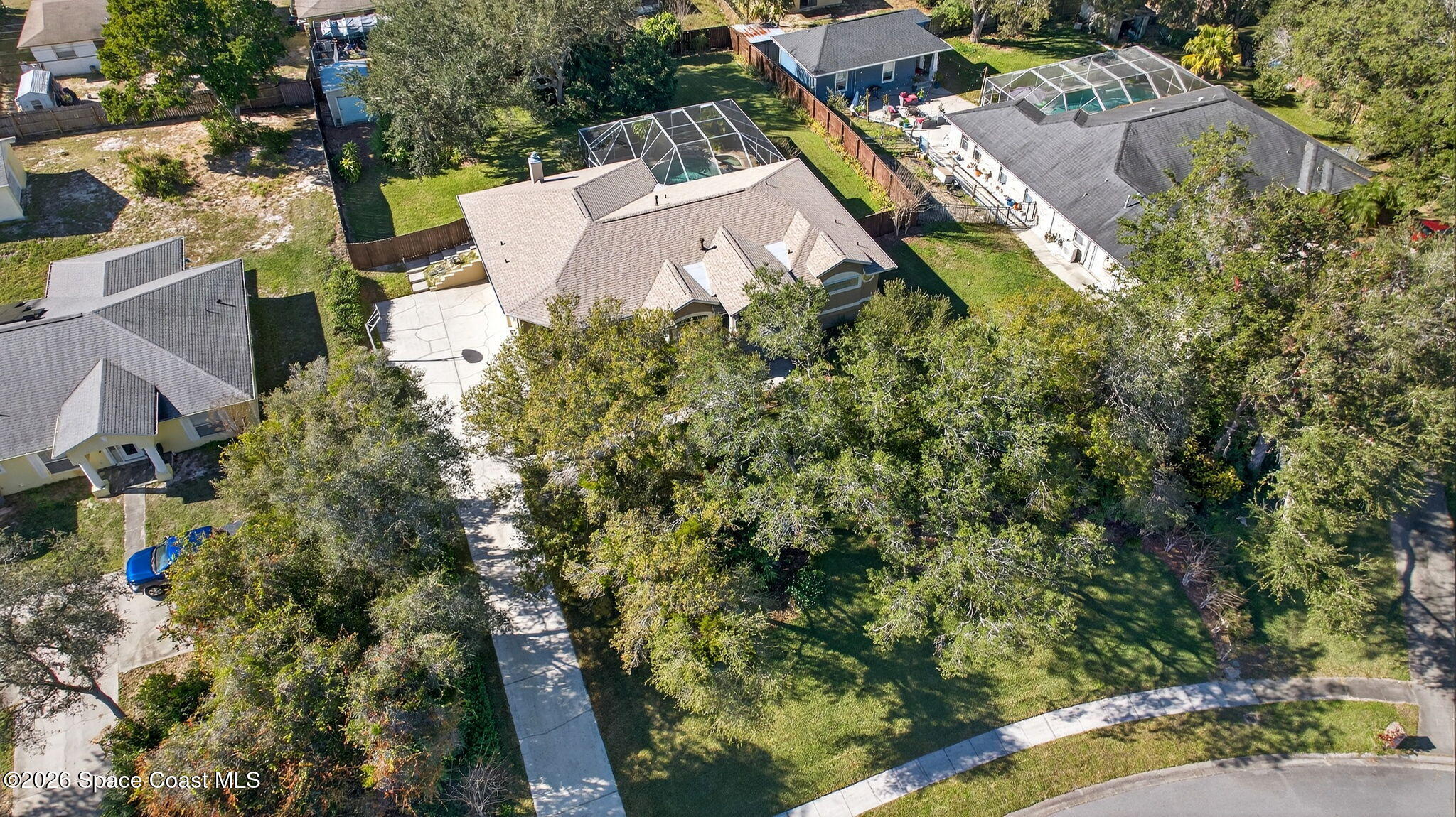 3676 South Ridge Circle Titusville, FL 32796 - Photo 67 of 74 an aerial view of a house with a yard and garden
