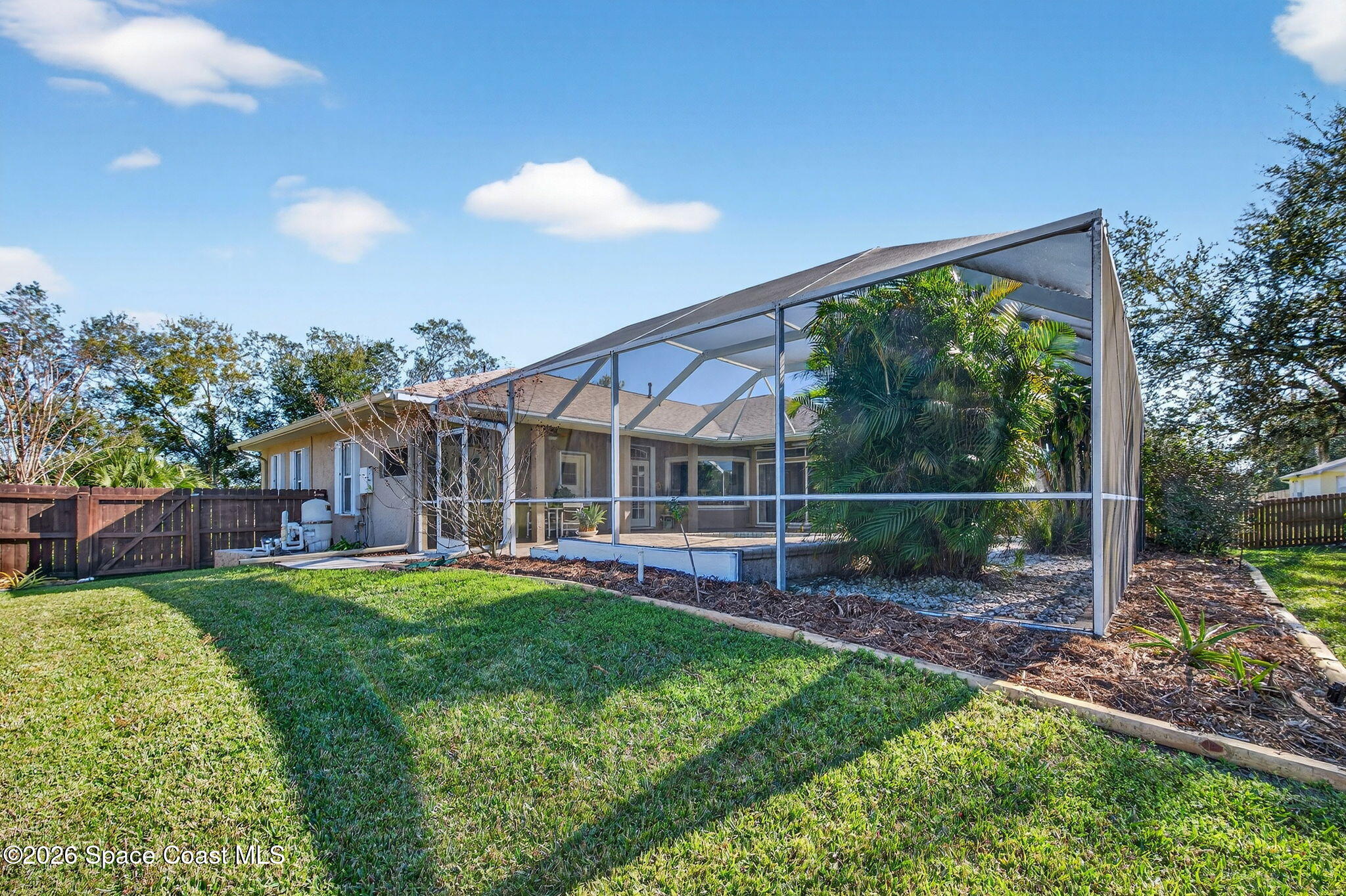 3676 South Ridge Circle Titusville, FL 32796 - Photo 68 of 74 a view of a house with a yard and sitting area
