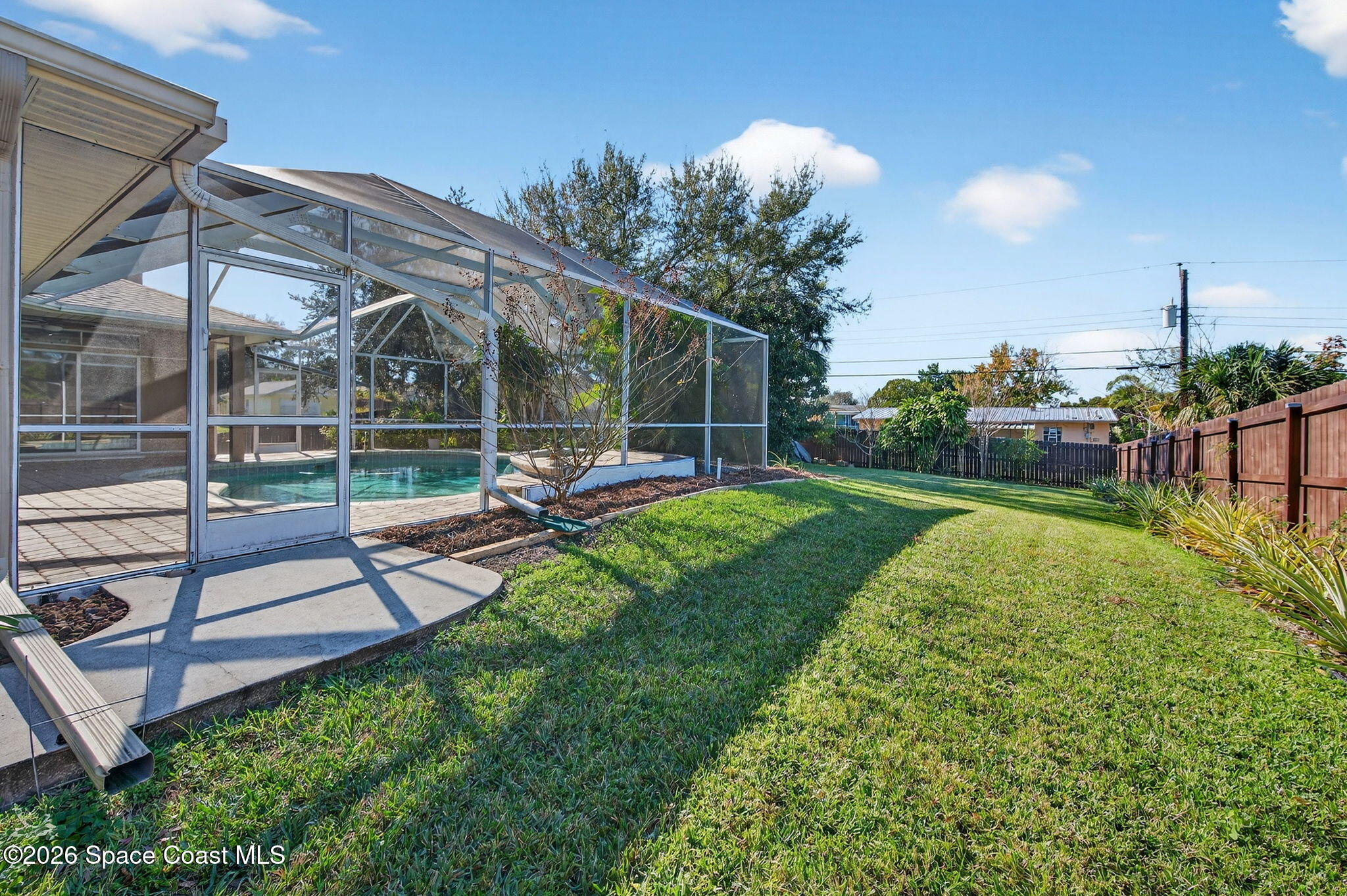 3676 South Ridge Circle Titusville, FL 32796 - Photo 71 of 74 a view of a backyard with sitting area