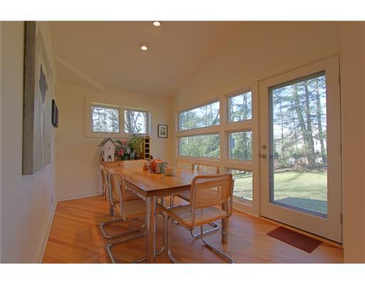 3 Cornelia Drive Greenwich, CT 06830 - Photo 6 of 16 a view of a dining room with furniture and a window