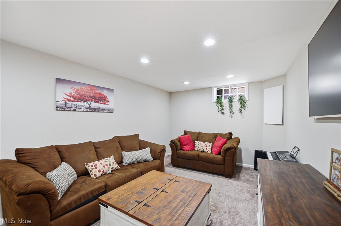3905 Kent Road Stow, OH 44224 - Photo 28 of 45 Living room with light carpet and recessed lighting