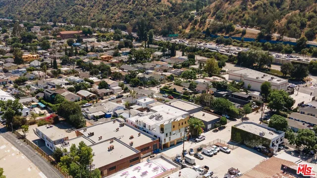 an aerial view of a city with lots of residential buildings