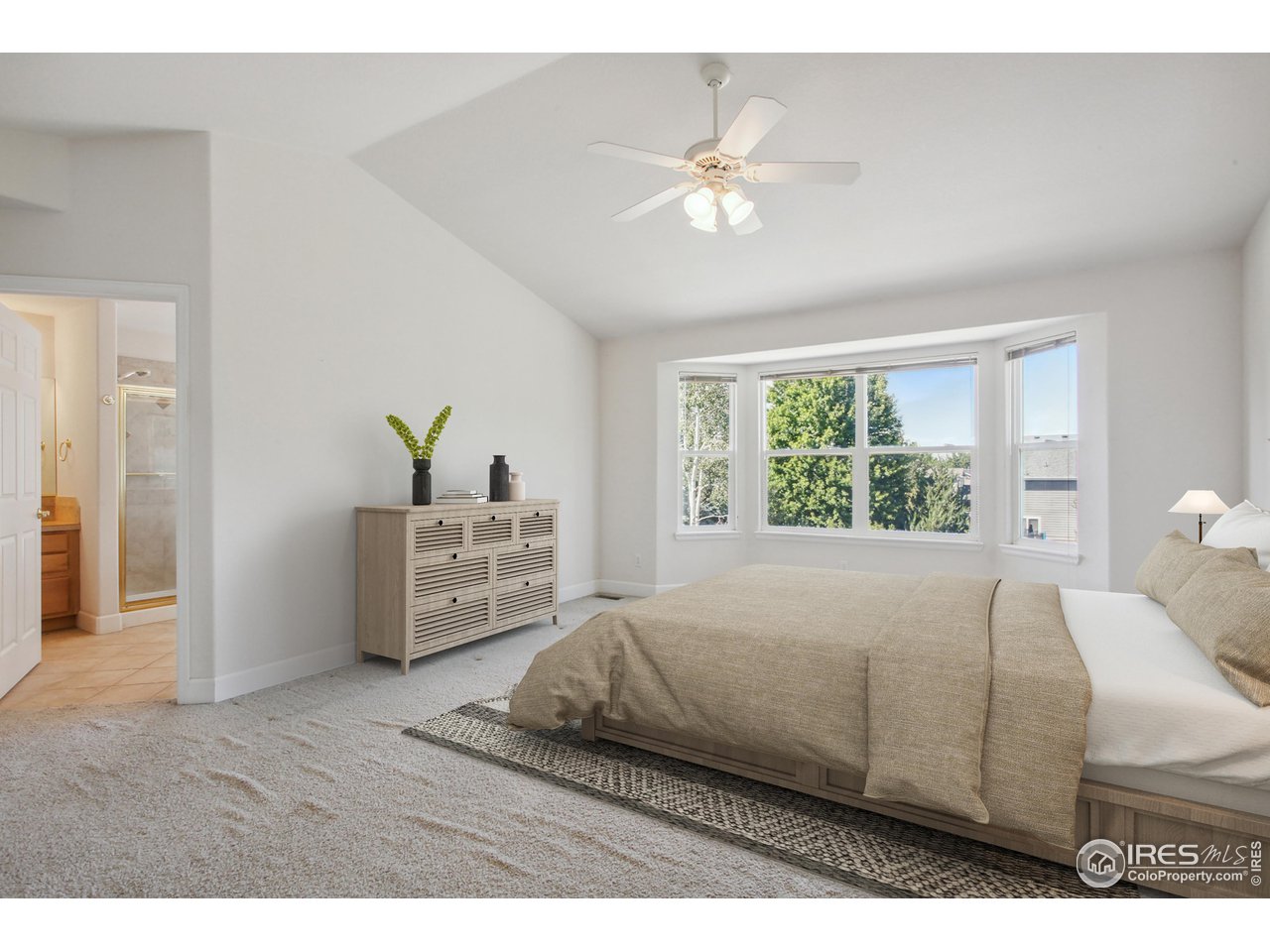 6735 Saddleback Avenue Firestone, CO 80504 - Photo 14 of 26 a bedroom with a bed and window