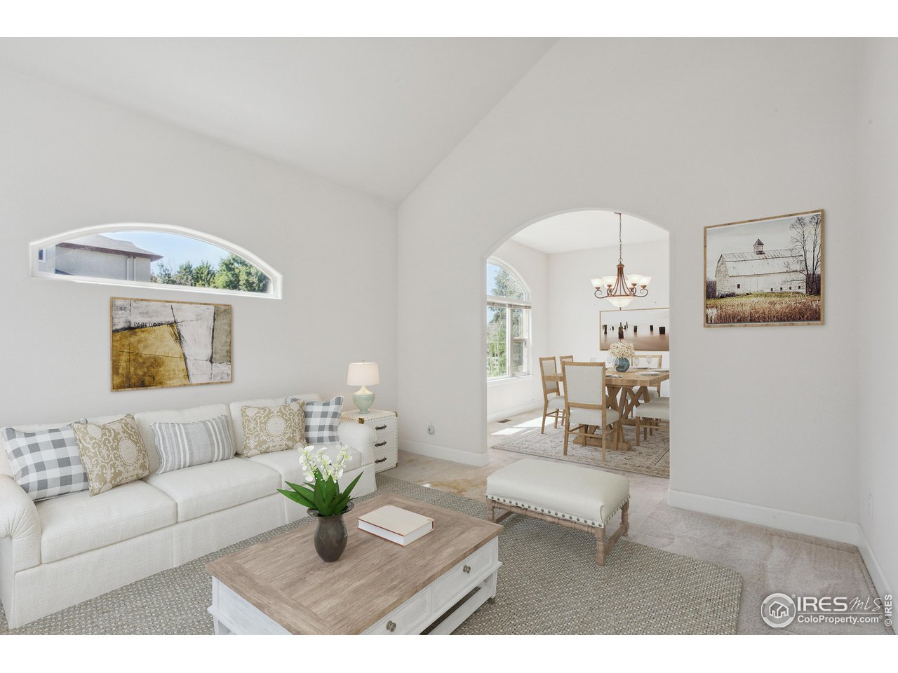 6735 Saddleback Avenue Firestone, CO 80504 - Photo 4 of 26 a living room with furniture and a chandelier