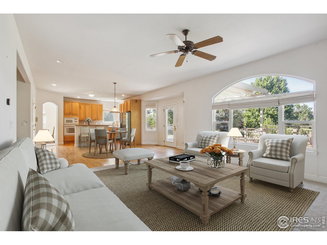 6735 Saddleback Avenue Firestone, CO 80504 - Photo 8 of 26 a living room with furniture and a large window