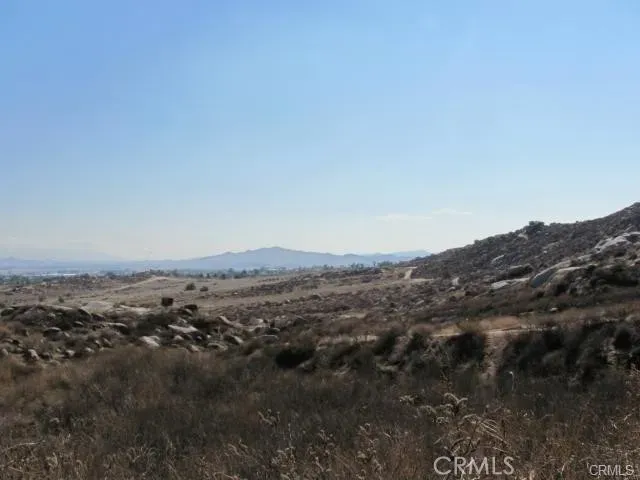 an aerial view of residential building and ocean view