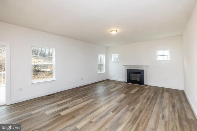 a view of a room that has a window in it