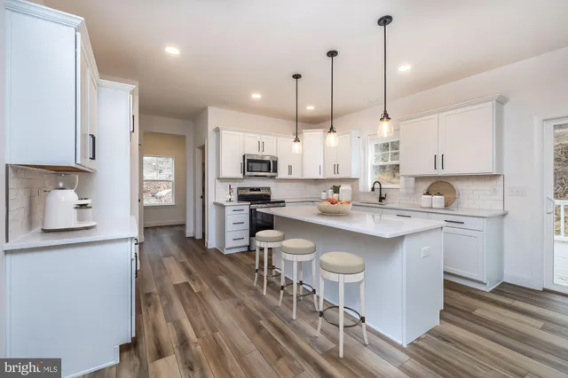 a view of a wooden fence