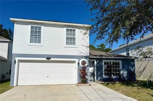 a view of a house with a garage
