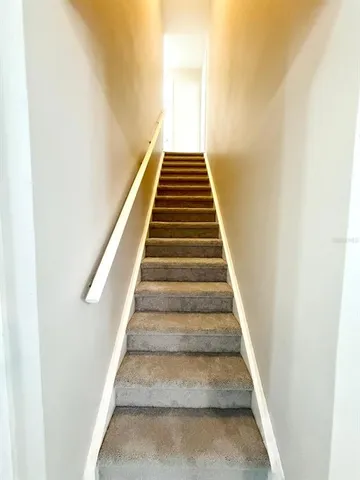 a view of a hallway with an empty room