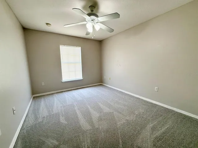 an empty room with a bathroom