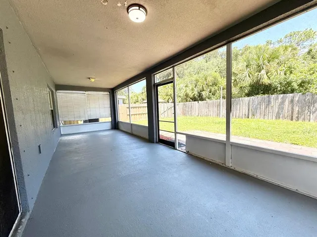 a view of swimming pool with a yard