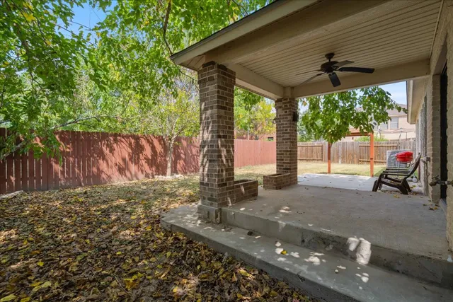 a garden view with a seating space