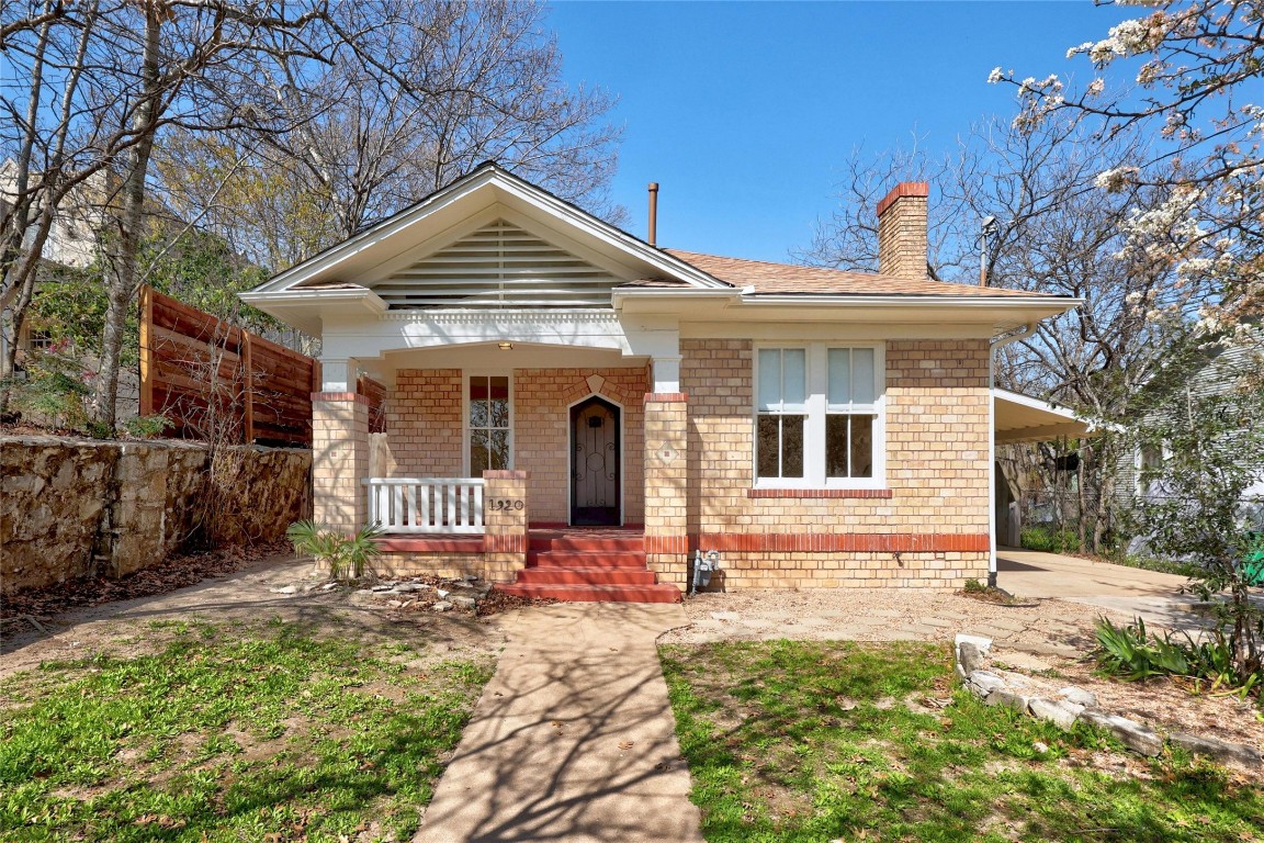 1920 Newning Avenue Austin, TX 78704 - Photo 1 of 26 a front view of a house with a yard