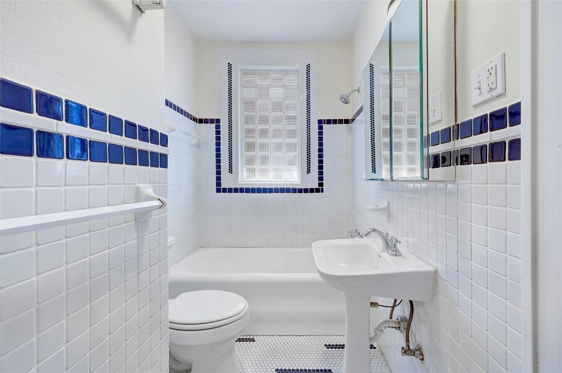 1920 Newning Avenue Austin, TX 78704 - Photo 12 of 26 a bathroom with a sink toilet and shower