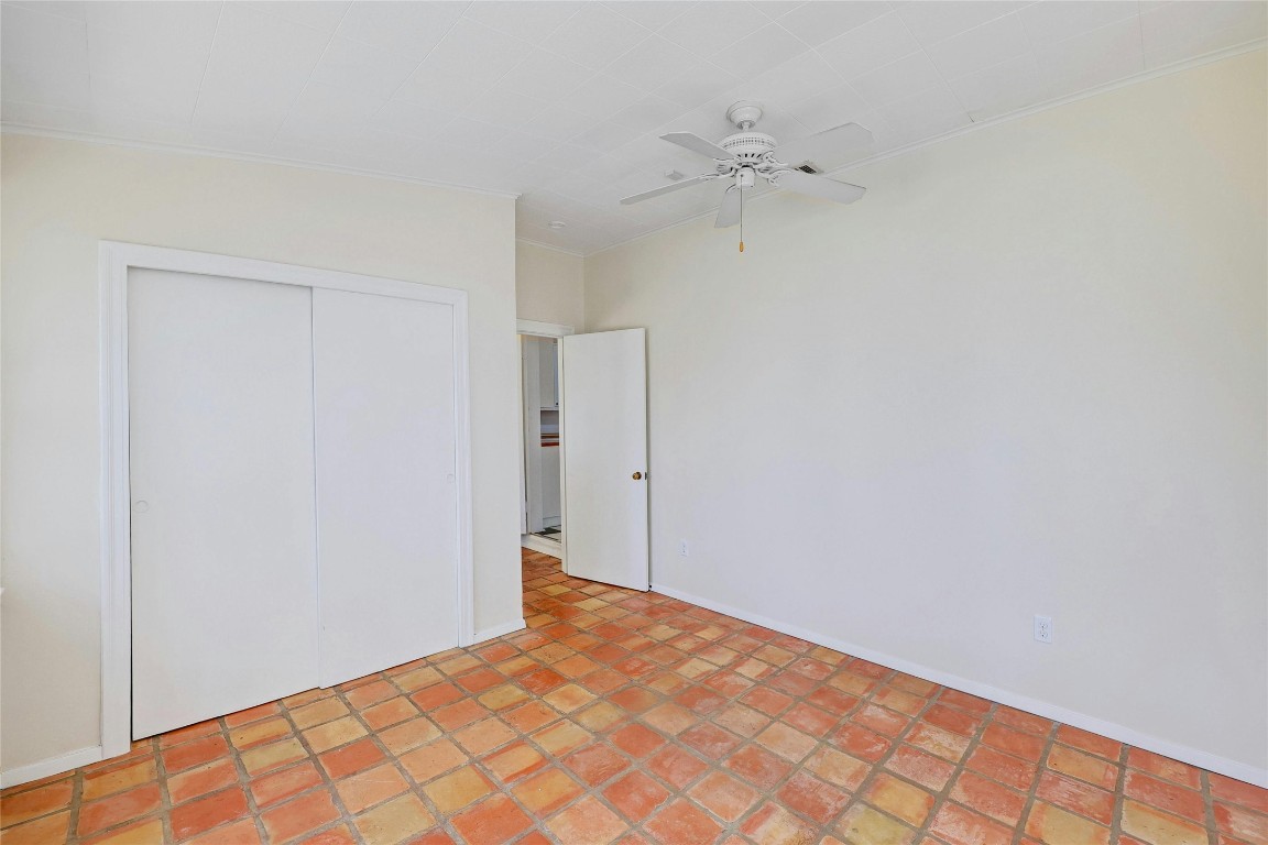 1920 Newning Avenue Austin, TX 78704 - Photo 15 of 26 a view of a room with a wooden floor and white walls