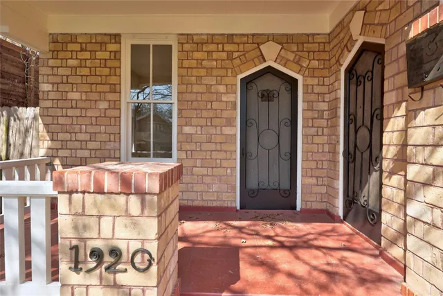 a front view of a house with a outdoor space