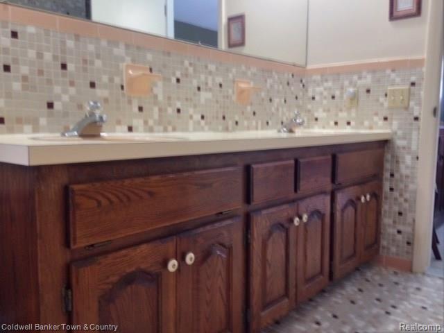 1800 Lone Tree Road Highland, MI 48357 - Photo 37 of 43 Double sink vanity