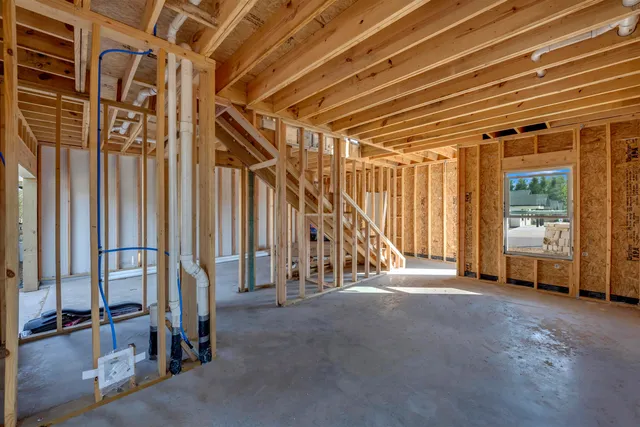 a view of an outdoor space with wooden deck