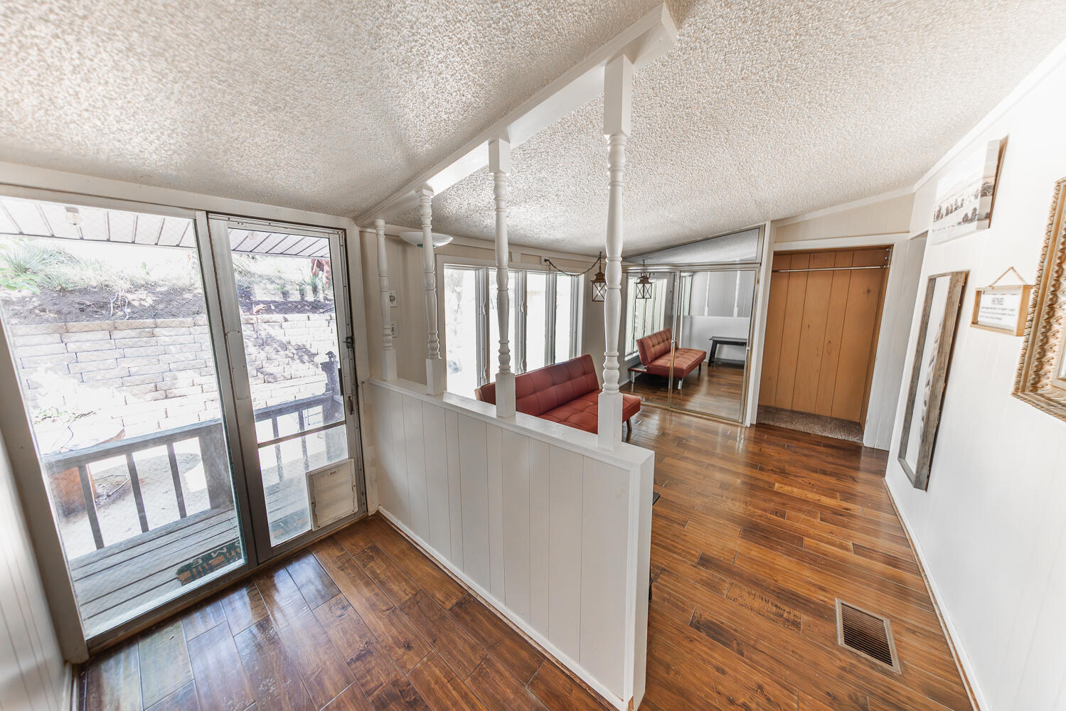 585 Comanche Drive Lubbock, TX 79404 - Photo 7 of 17 a living room with furniture and a wooden floor