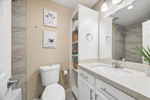 a front view of house with yard and outdoor seating