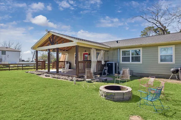 a view of a deck with wooden floor and outdoor space