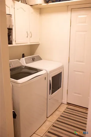 a kitchen with stainless steel appliances granite countertop a stove and a microwave