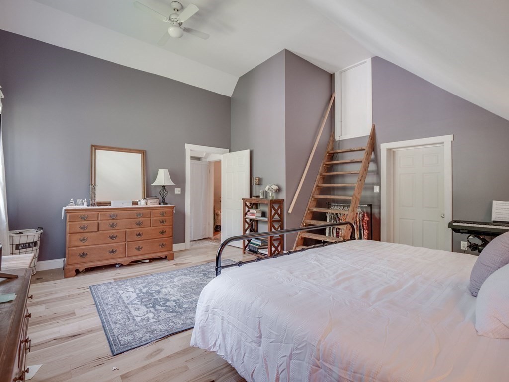 59 Hubbardston Road Templeton, MA 01468 - Photo 14 of 28 a bed room with a bed and a window