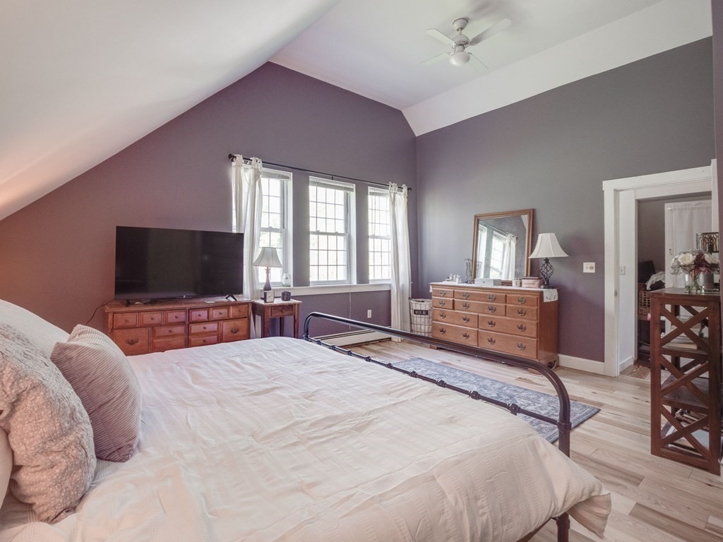 59 Hubbardston Road Templeton, MA 01468 - Photo 15 of 28 a bedroom with a bed and a flat screen tv