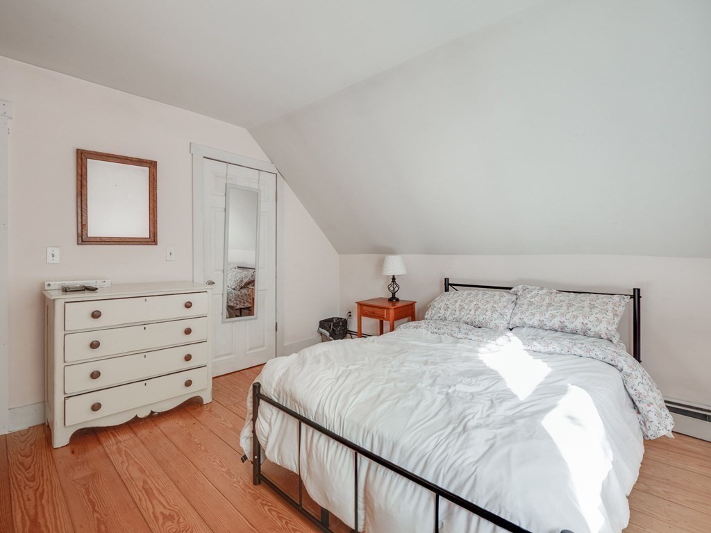 59 Hubbardston Road Templeton, MA 01468 - Photo 20 of 28 a bedroom with a bed and a dresser