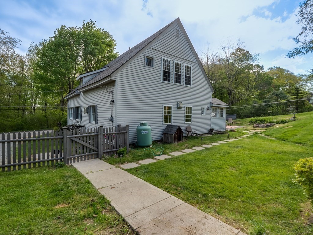59 Hubbardston Road Templeton, MA 01468 - Photo 28 of 28 a view of a house with a yard and deck