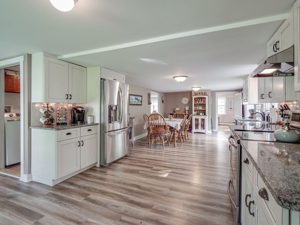 59 Hubbardston Road Templeton, MA 01468 - Photo 3 of 28 a kitchen with stainless steel appliances granite countertop a refrigerator and microwave