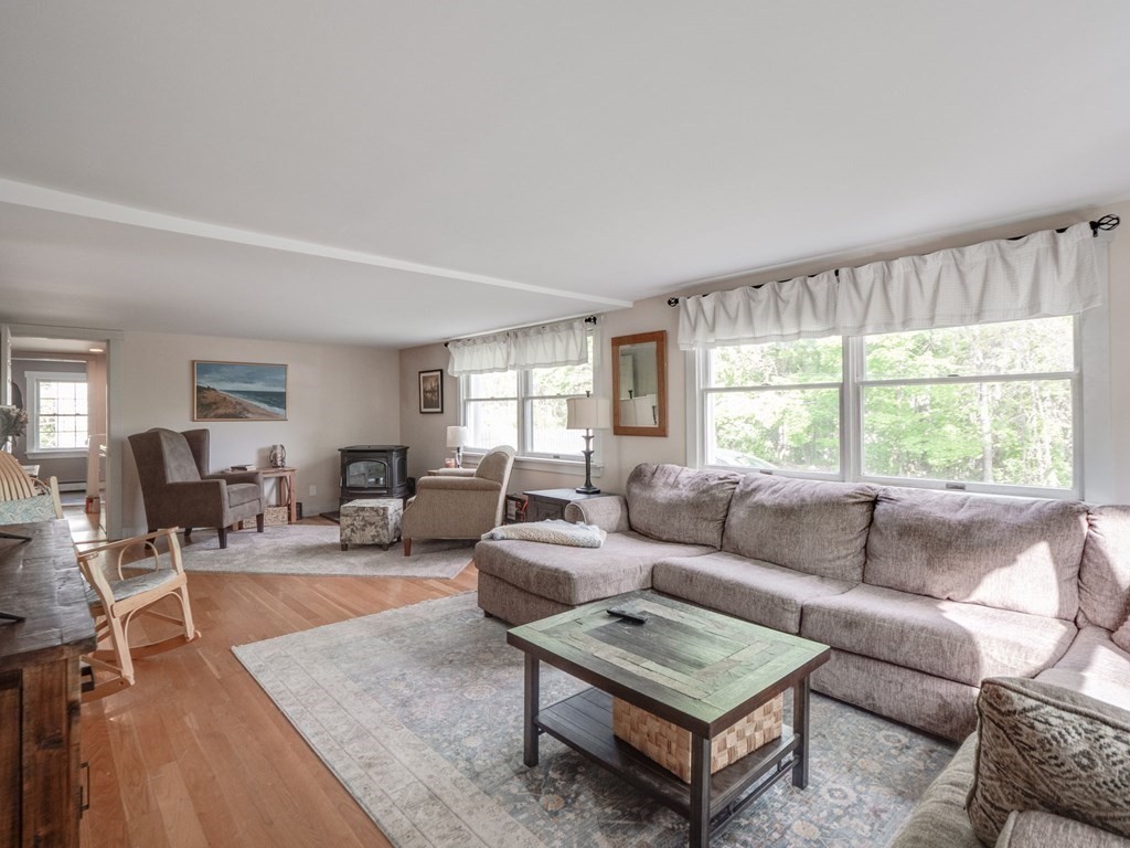 59 Hubbardston Road Templeton, MA 01468 - Photo 8 of 28 a living room with furniture and a large window