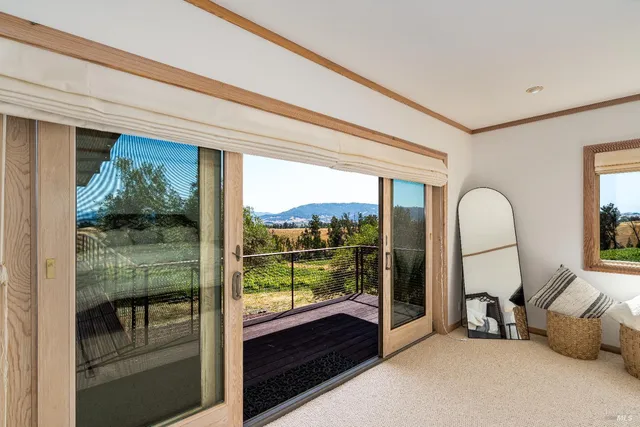 a bathroom with a shower and toilet