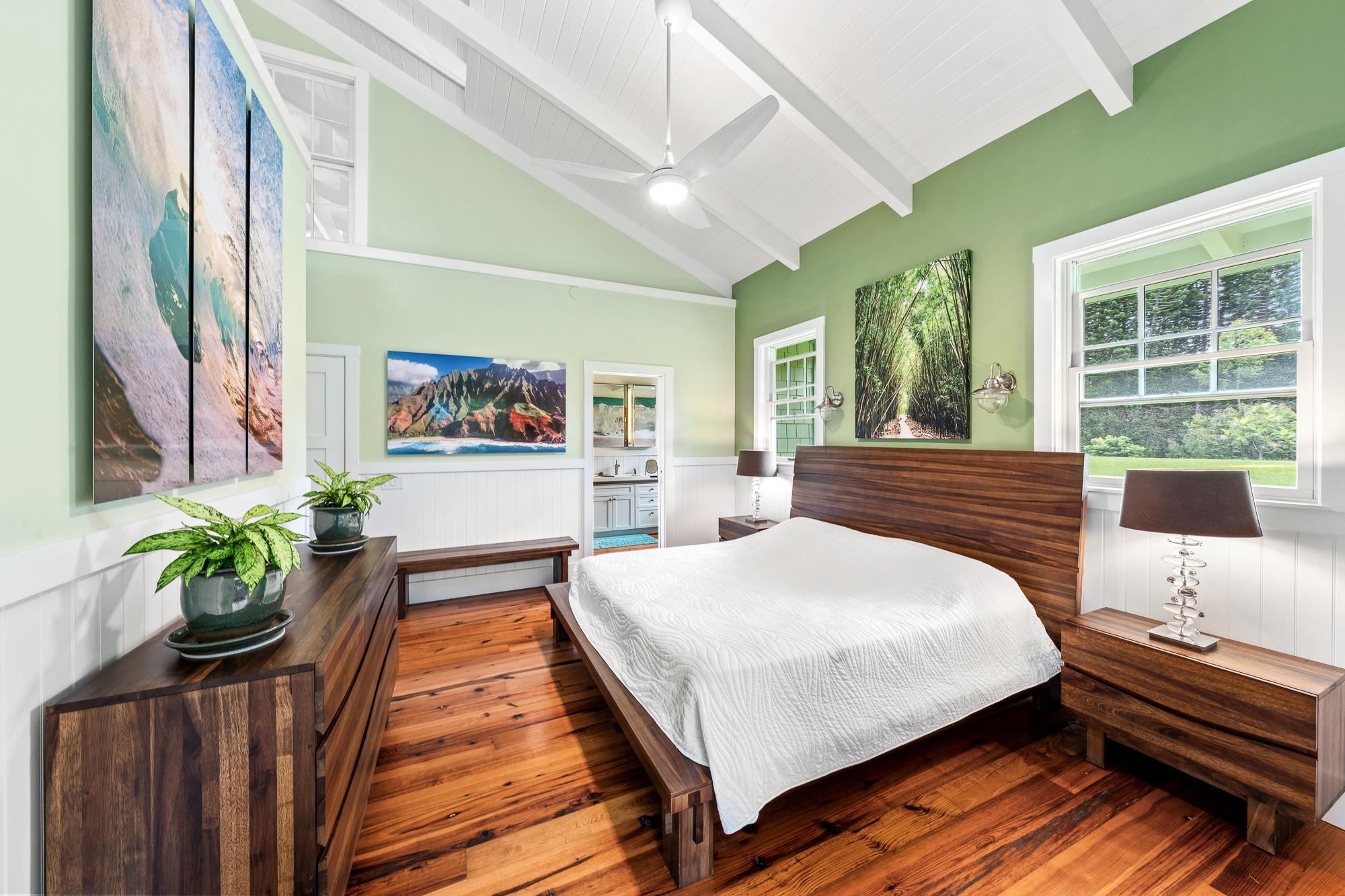 1949 West Kuiaha Road Haiku, HI 96708 - Photo 41 of 49 a bedroom with a bed and a potted plant