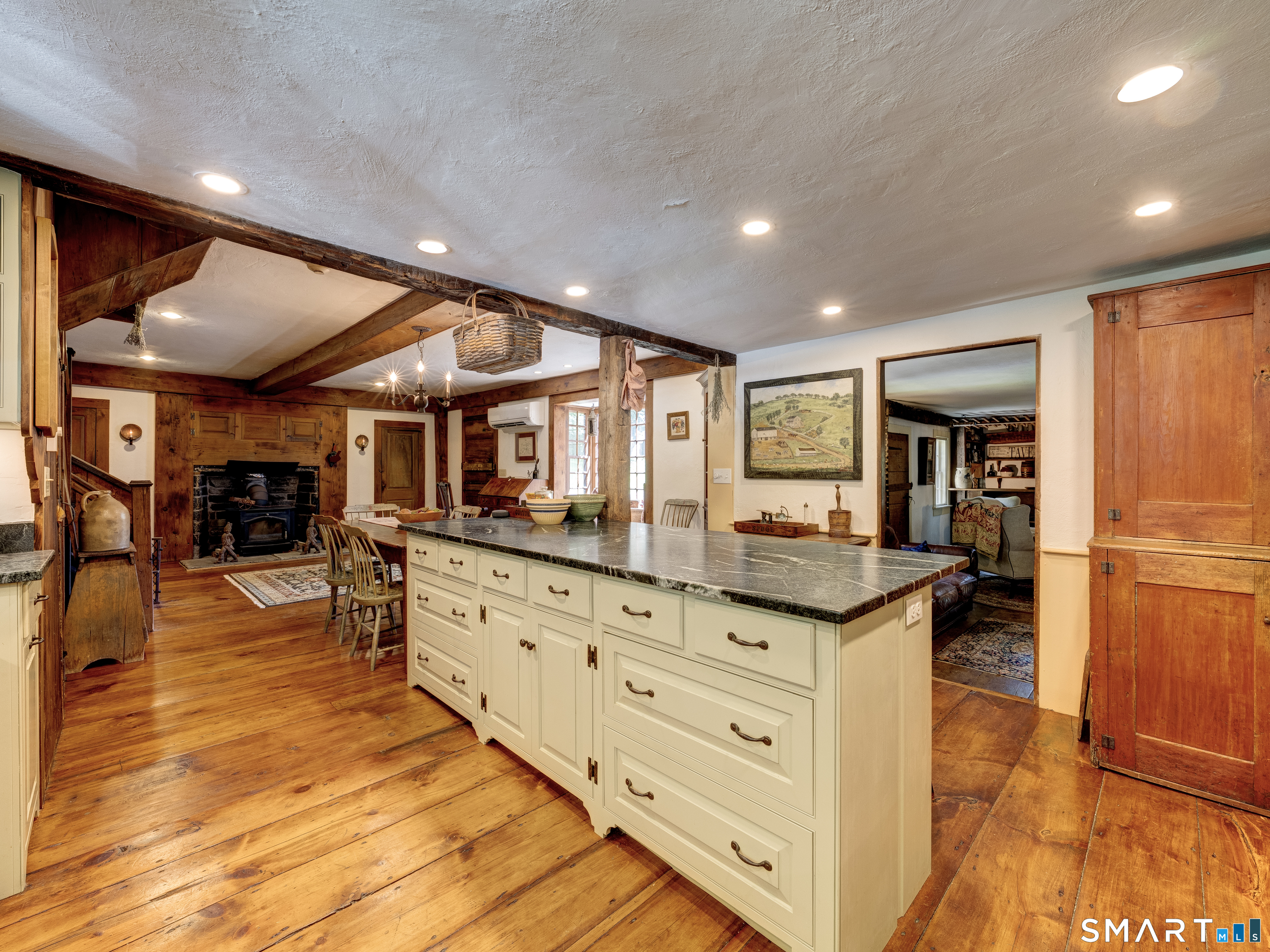 64 Haddam Quarter Road Durham, CT 06422 - Photo 24 of 40 A wood burning fireplace adds comfort and charm and warmth to this room.