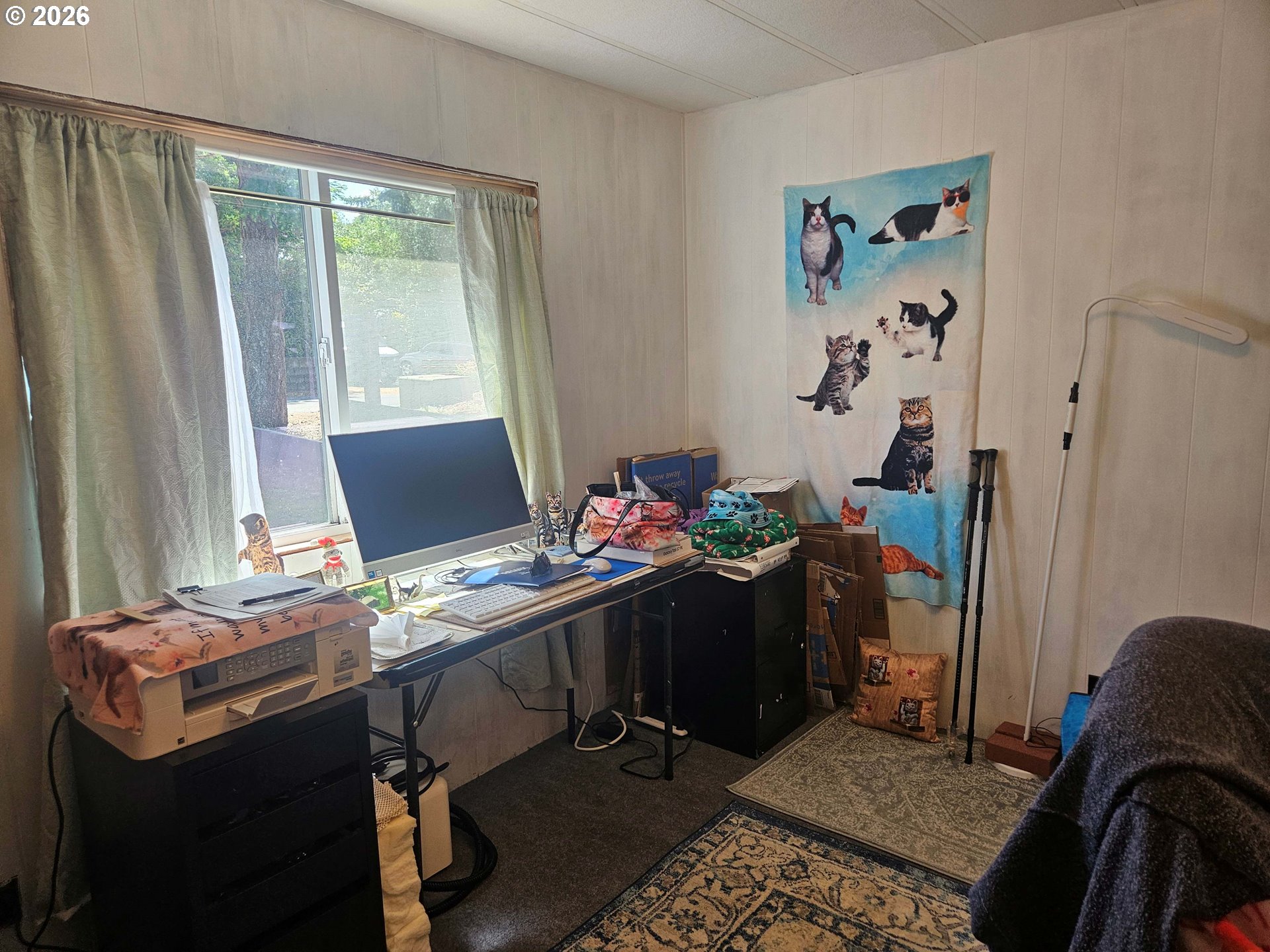 1600 Rhododendron Drive, Unit 214 Florence, OR 97439 - Photo 6 of 38 a view of a workspace with furniture and a window