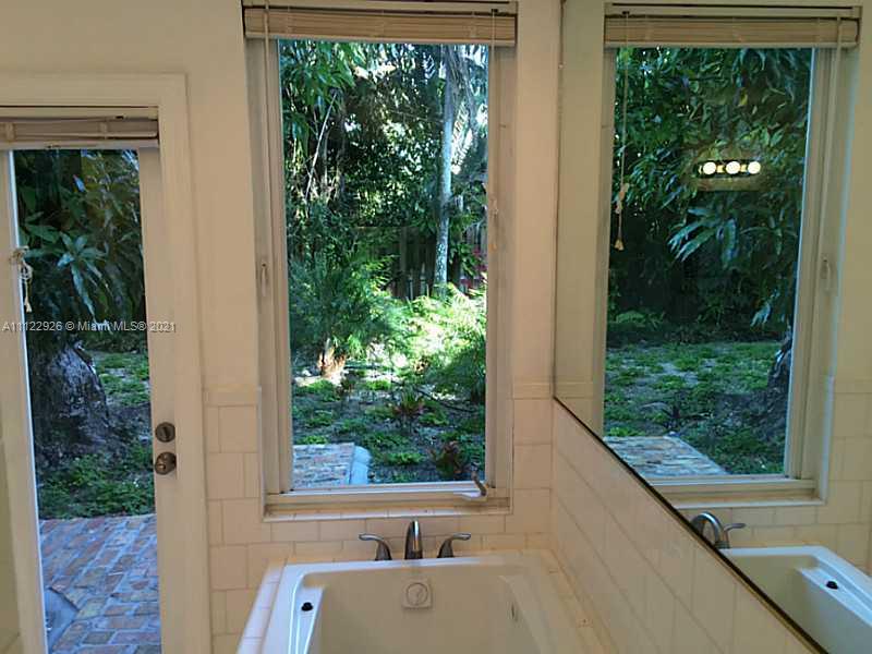 3797 El Prado Boulevard Miami, FL 33133 - Photo 9 of 26 a view of a window and outside view