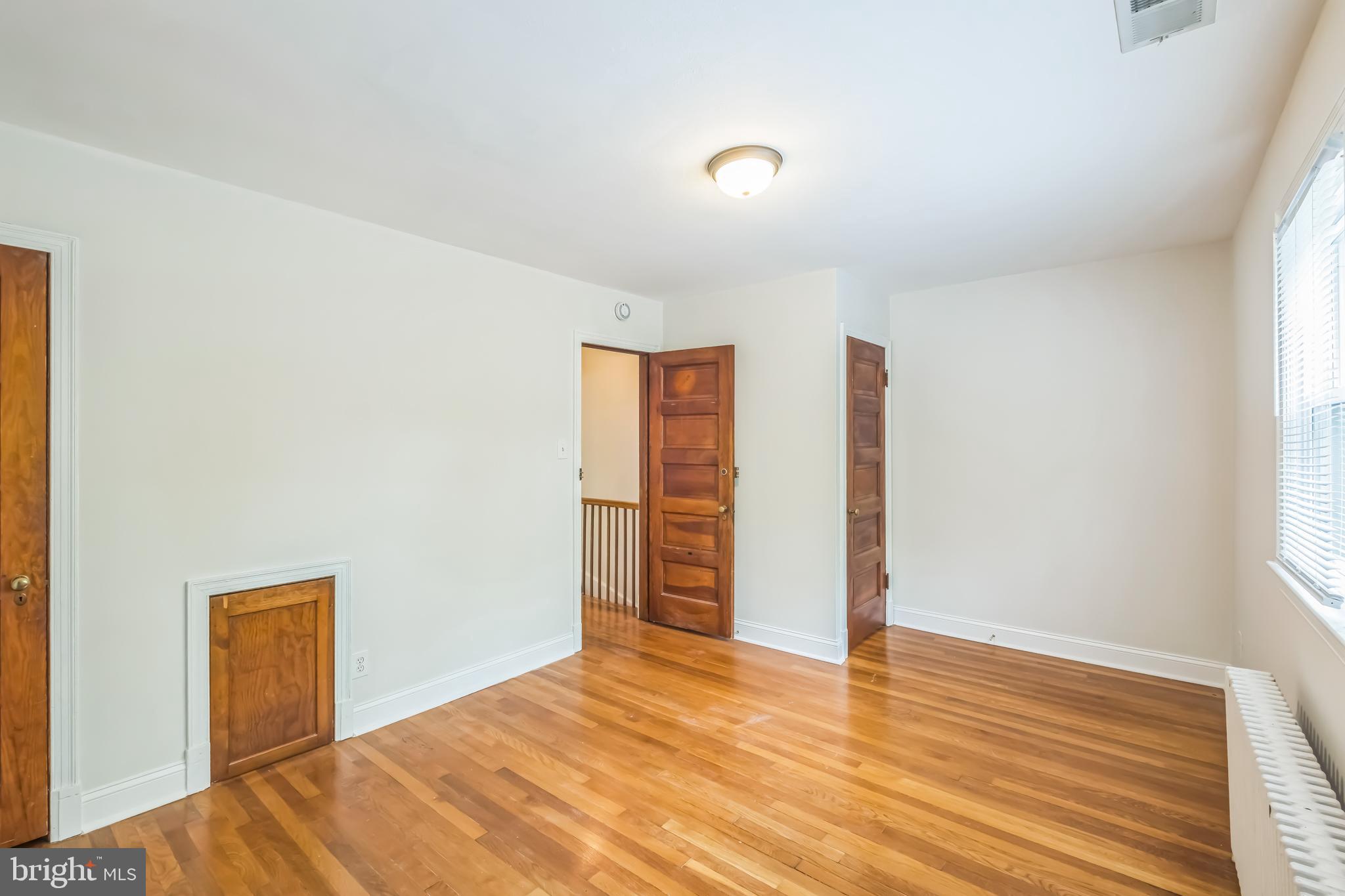 1407 K Street Southeast Washington, DC 20003 - Photo 11 of 30 a view of empty room with wooden floor