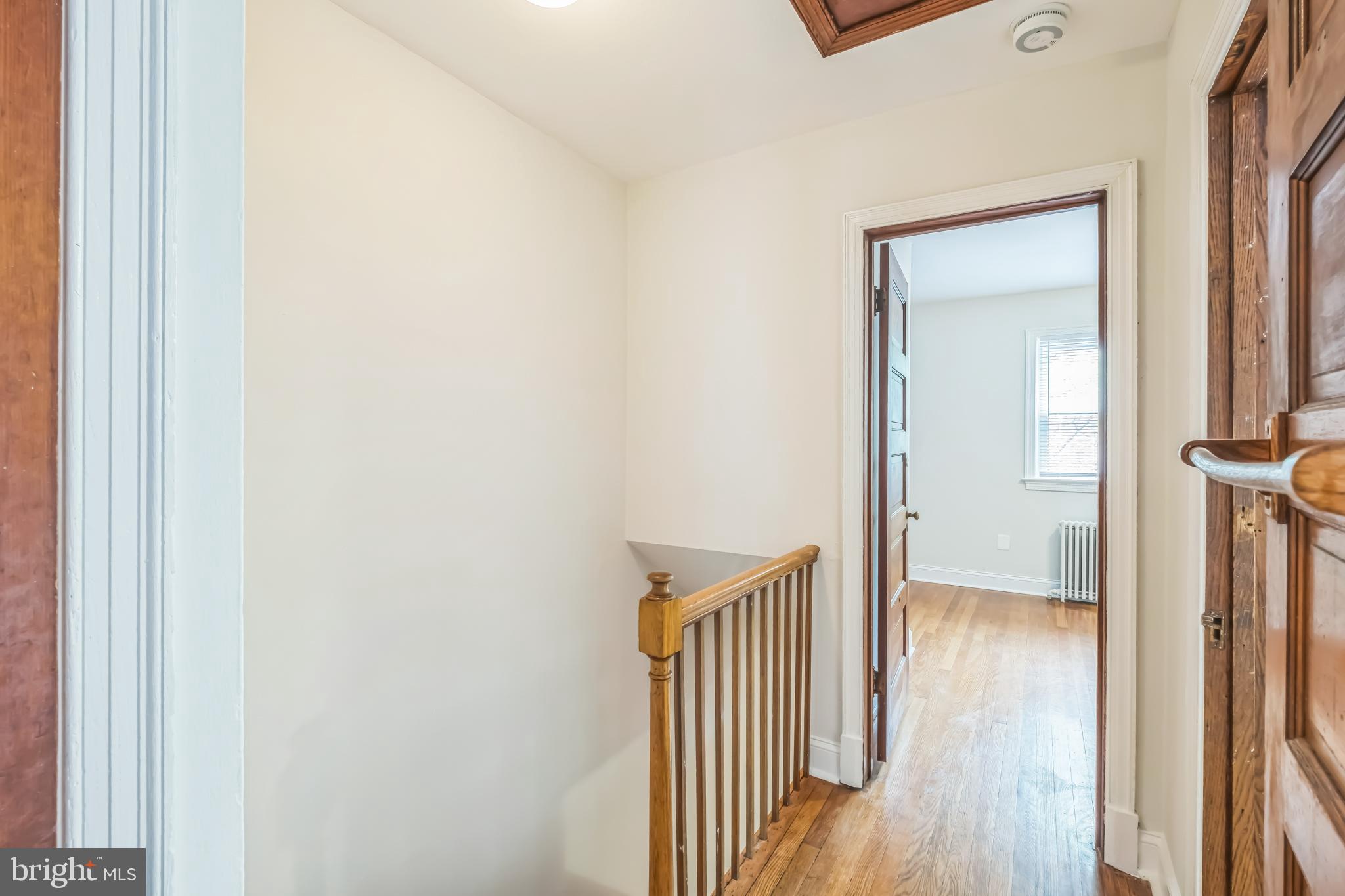 1407 K Street Southeast Washington, DC 20003 - Photo 17 of 30 a view of a hallway with wooden floor