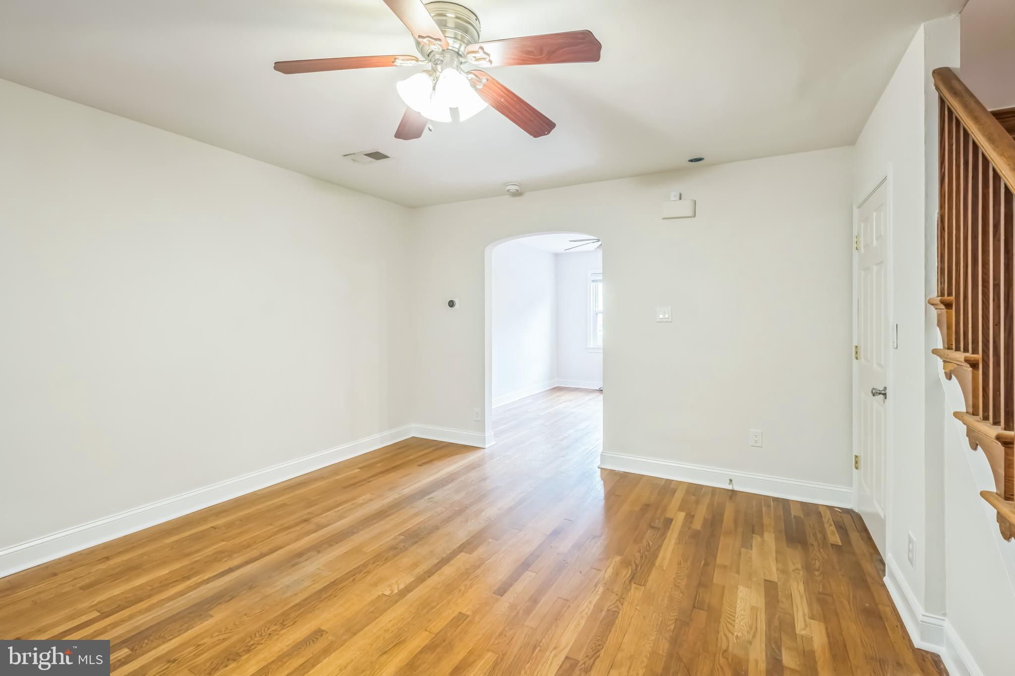 1407 K Street Southeast Washington, DC 20003 - Photo 5 of 30 wooden floor in an empty room