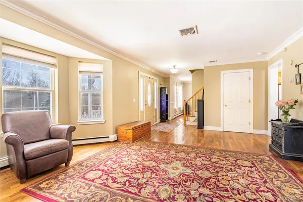 a living room with furniture and a couch