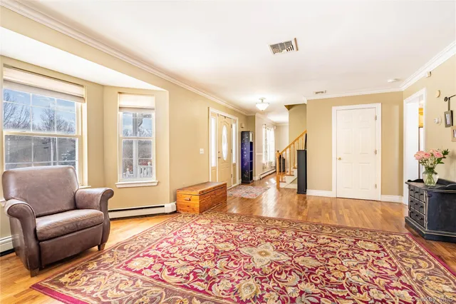 a living room with furniture and a couch
