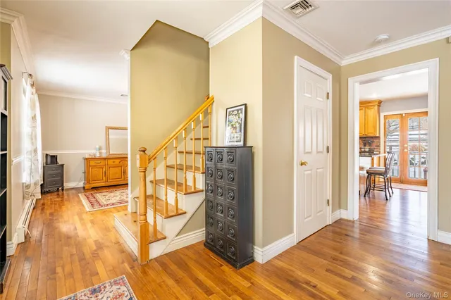 a view of a living room with a wooden floor