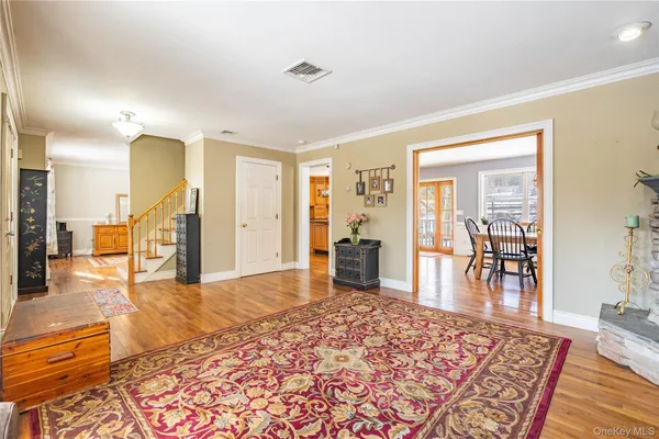 a living room with furniture and a table