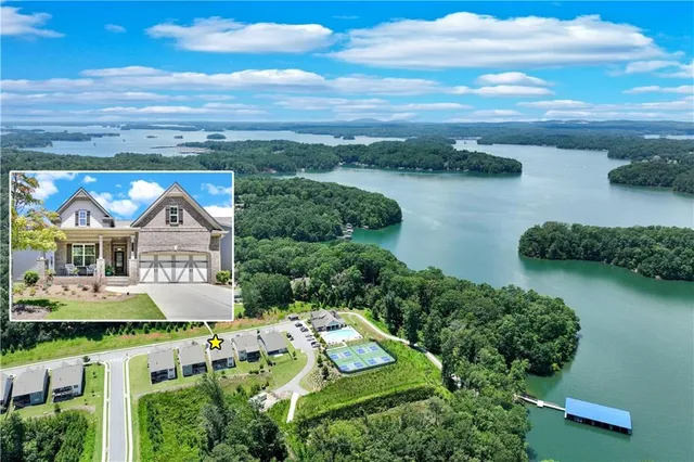 a aerial view of a house with swimming pool and sitting area