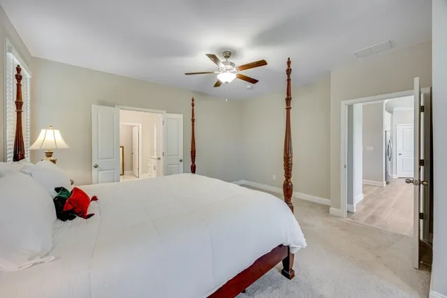 a living room with fireplace furniture and a flat screen tv