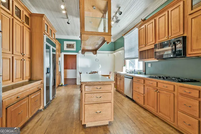 a room with gym equipment and a large window